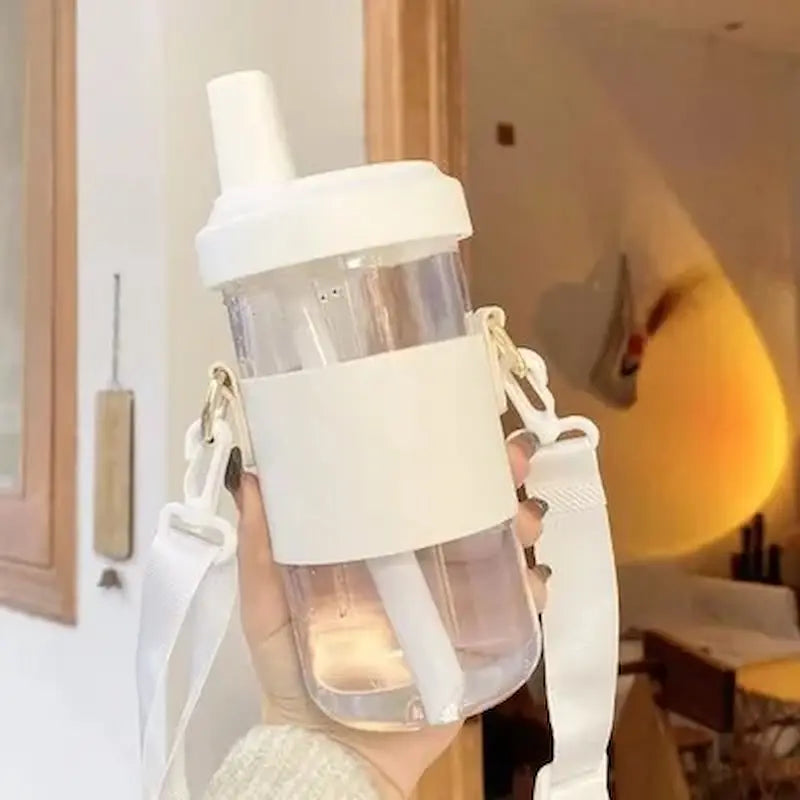 Gourde en verre avec paille