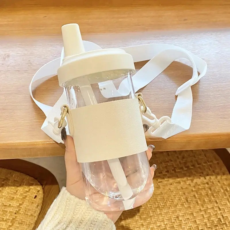 Gourde en verre avec paille