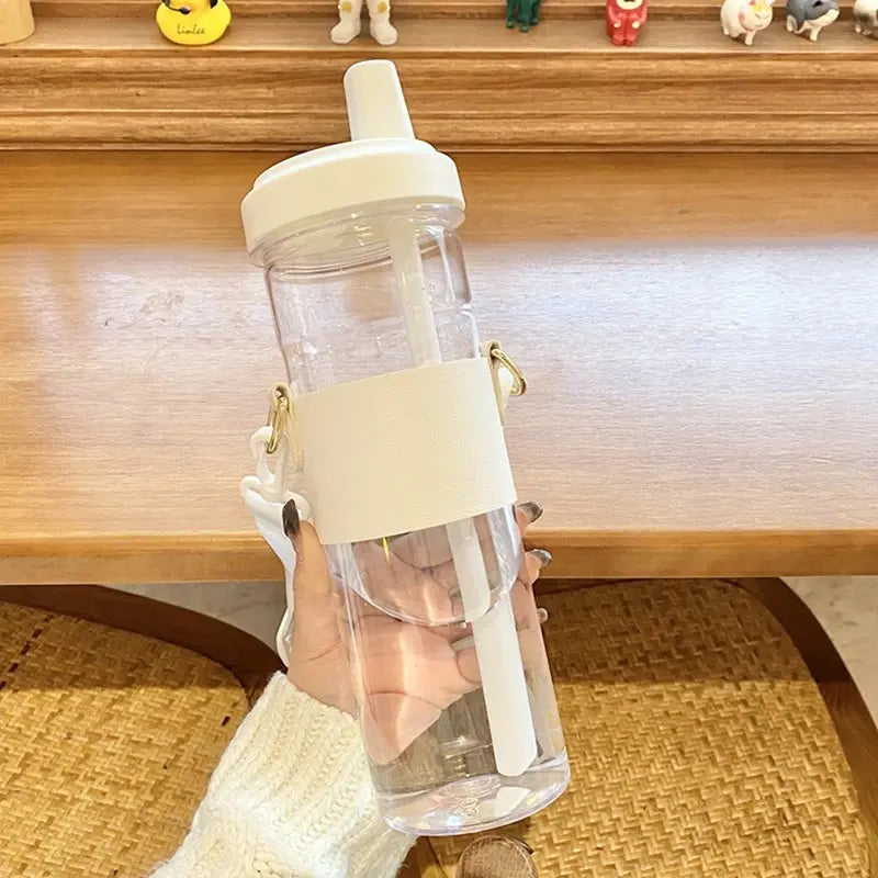 Gourde en verre avec paille