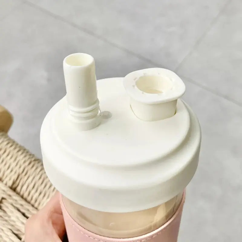 Gourde en verre avec paille